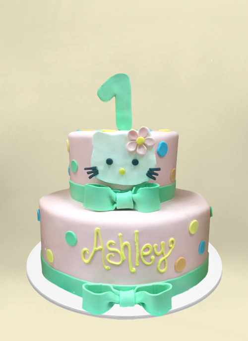 Photo: fondant cake with hello kitty face and polka dots