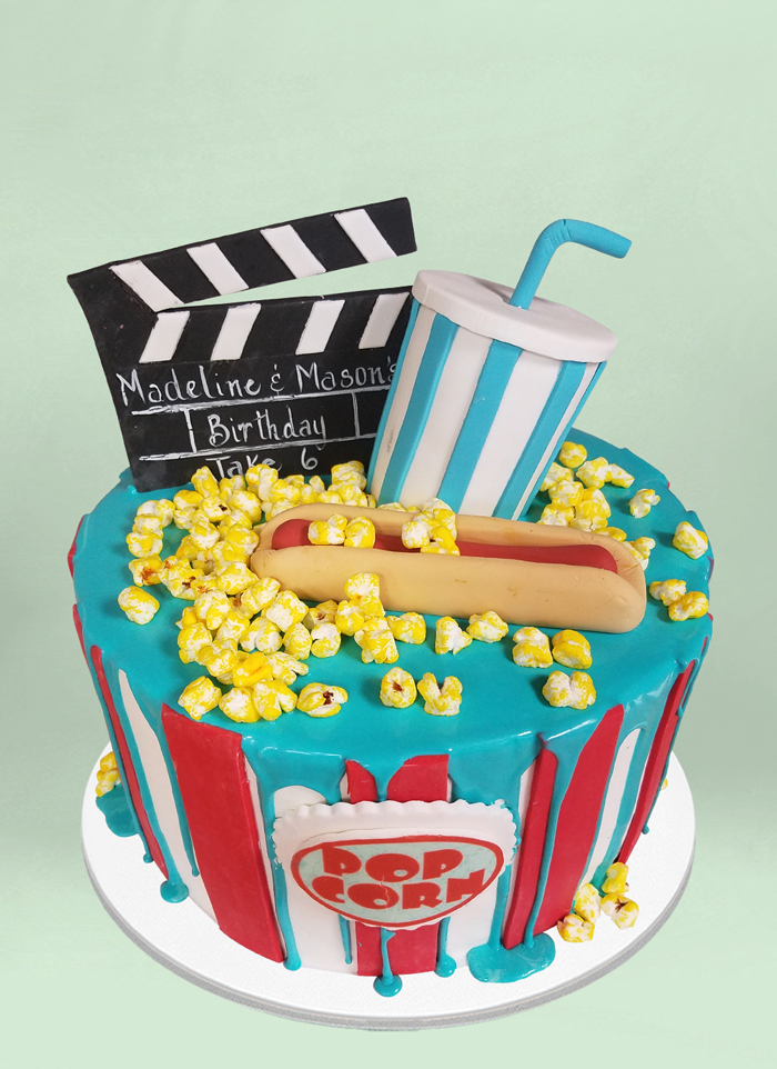 Photo: popcorn bucket wit movie themed cake