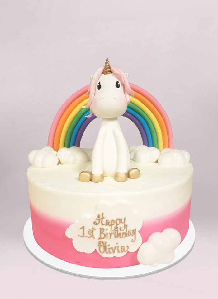 Photo: unicorn and rainbow fondant cake