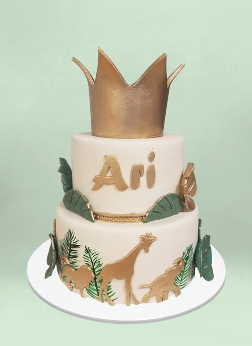 Photo: jungle and gold crown fondant cake