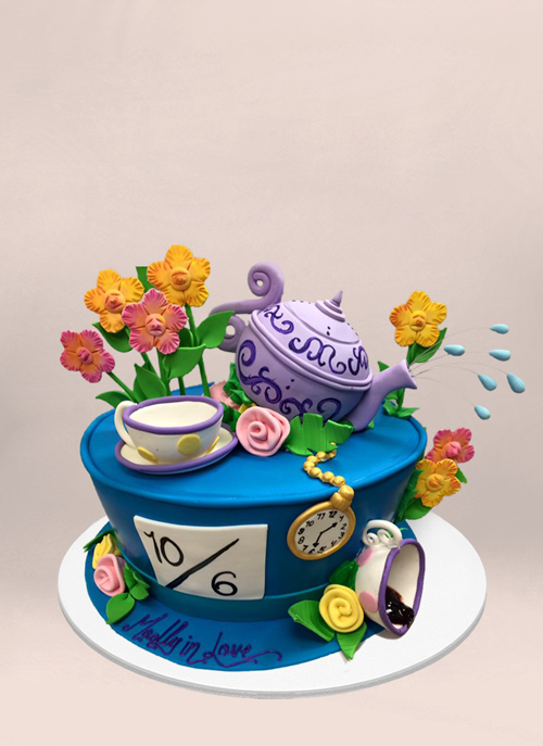 Photo: mad hatter themed hat with 3d fondant teapot, cup, flowers and clock
