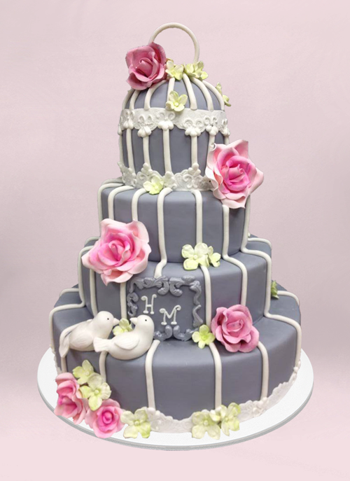 Photo: 4 tier fondant cake with flowers and piping to look like a bird cage