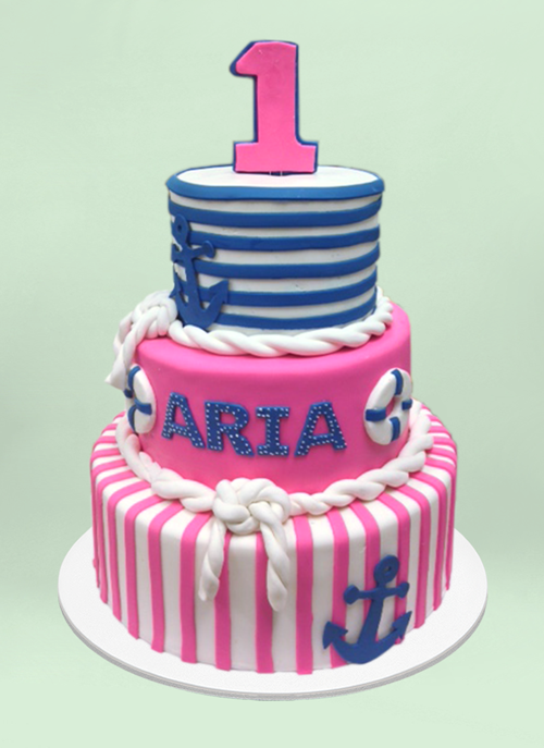 Photo: pink, white, blue fandant stripes with fondant ropes on each iter and nautical elements