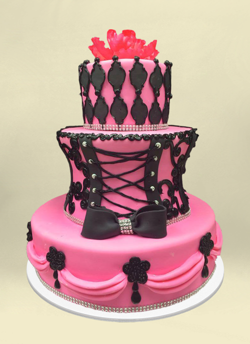 Photo: pink fondant cake with fondant corset pulling in middle tier