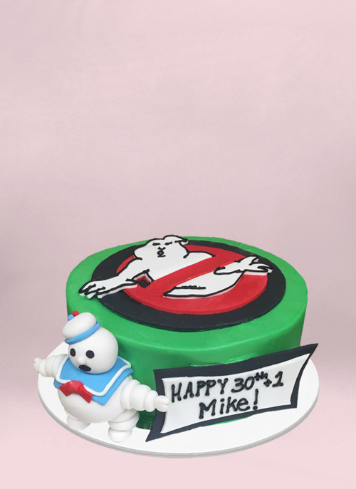 Photo: 1 tier green ghost busters cake with logo on top and 3d fondant ghost